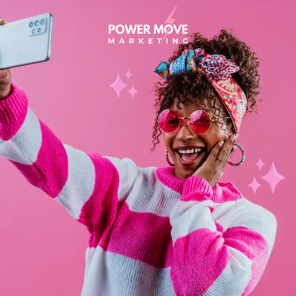 a picture of an influencer taking short form video content on a pink background